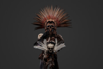 Ancient witch with plumed headdress and staff with skull. High quality photoShot of aztec witch...