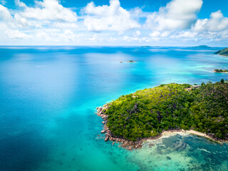 Praslin Seychelles tropical island with withe beaches and palm trees. Aerial view of tropical...