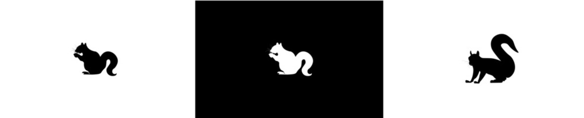 silhouette of squirrel eating acorn and walking.