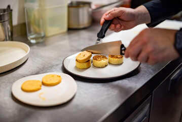 chef cooking Terrine of foie gras on kitchen