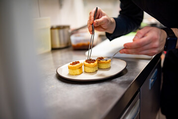 chef cooking Terrine of foie gras on kitchen