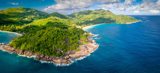Aerial view of beautiful tropical paradise beach Anse Intendance at Seychelles, Mahe. Stone coast...