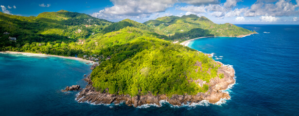 Aerial view of beautiful tropical paradise beach Anse Intendance at Seychelles, Mahe. Stone coast...
