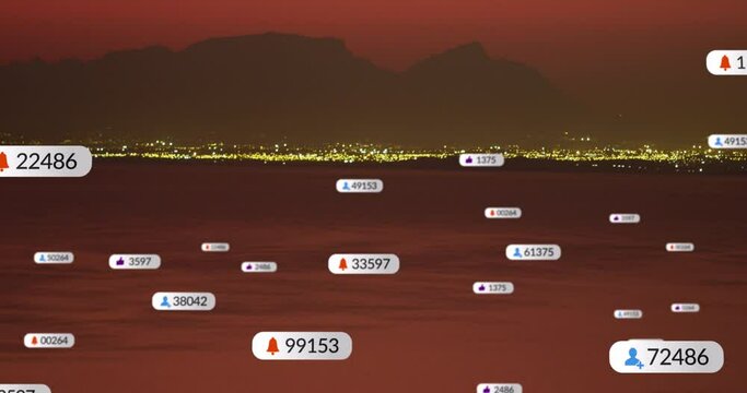 Animation of social media icons over sunset and sea landscape