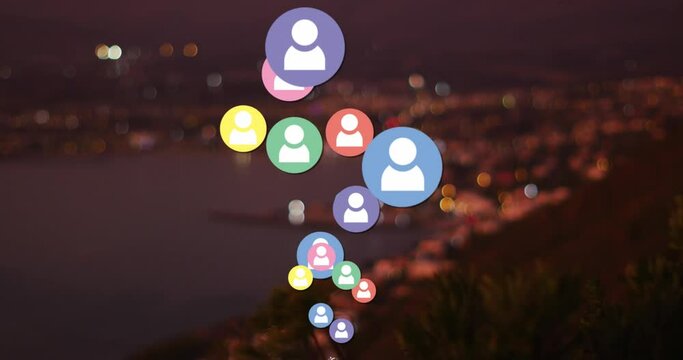 Animation of social media icons and rocky shore with sea landscape