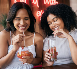 Cocktail, drink and happy hour with black woman friends drinking in a club or bar together for fun....