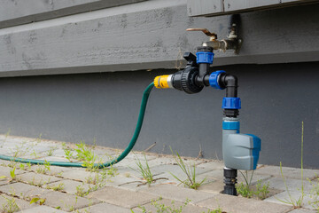Watering system pipes for the garden outside. Sprinkling circulation water pipes.