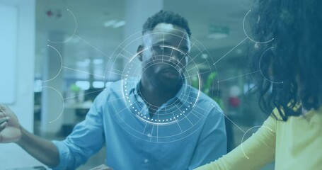 Animation of scope scanning over diverse business people having meeting at office - Powered by Adobe