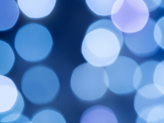 Christmas blue lights background out of focus. Texture for design. Blur