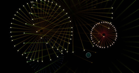 Image of fireworks exploding over black background