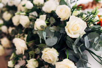 closeup of a beautiful wedding bouquet of white roses.