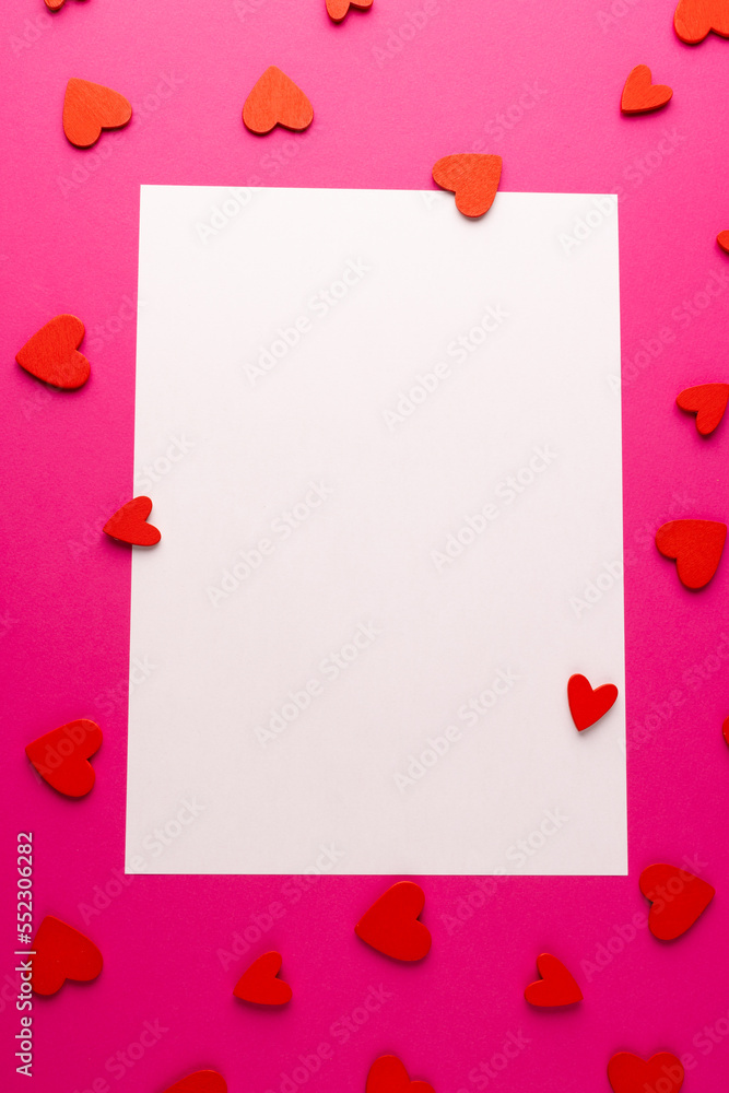 Poster vertical white rectangular copy space with red heart shapes on pink background