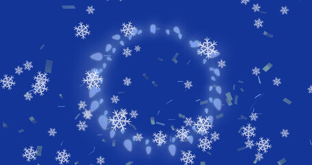 Obraz na płótnie Canvas Image of snowflakes over christmas lights on blue background