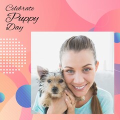 Composition of celebrate puppy day text over happy caucasian woman with dog