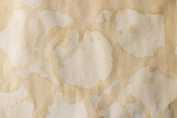 White stained piece of paper with copy space on white background