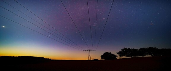 night starry sky and power lines european energy crisis 2022 blackout concept