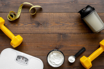 Sports food supplement. Whey protein powder in jar and shaker bottle