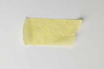 Yellow masking tape with copy space on white background