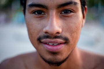 Obraz premium Head shot of a latin hispanic young man