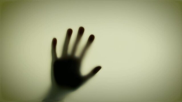 shadows of hands hit the glass. Thriller, horror, violence concept