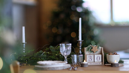 Winter holidays, dinner party and celebration concept - christmas table serving at home. Beautiful decoration