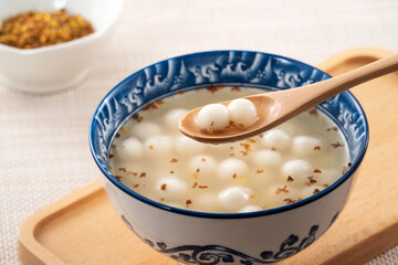 Little white tangyuan with sweet osmanthus honey and syrup soup.
