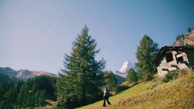 hiking girl in switzerland with stunning landscape