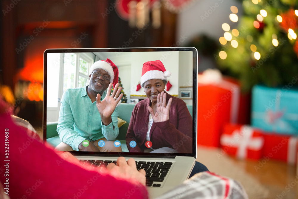 Sticker Caucasian woman having video call with happy african american couple