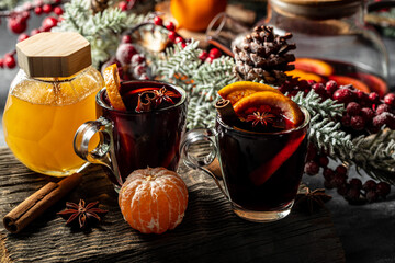 Hot red mulled wine in glass with orange, Traditional hot drink or beverage, festive cocktail, Long banner format