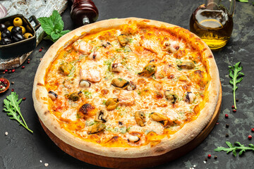 pizza with seafood on a dark background, banner, menu, recipe place for text, top view