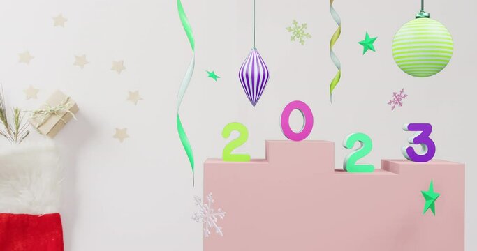 Animation of 2023 text and christmas decorations in background