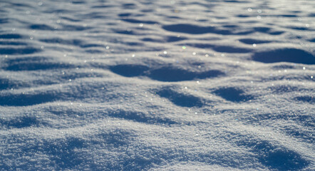 winter snow background - snow covered surface and artistic bokeh