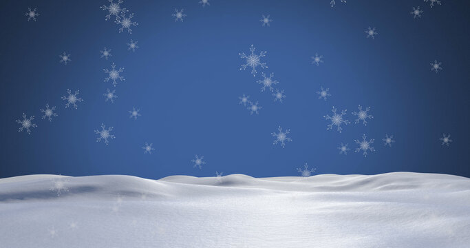 Image of snowflakes falling over snow and blue background