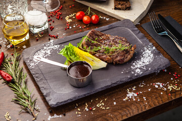 Black Angus Entrecote steak. Marbled steak from Uruguay. Delicious healthy traditional food closeup served for lunch in modern gourmet cuisine restaurant