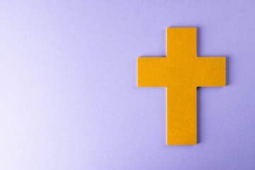 Composition of christian ash wednesday cross on purple background with copy space