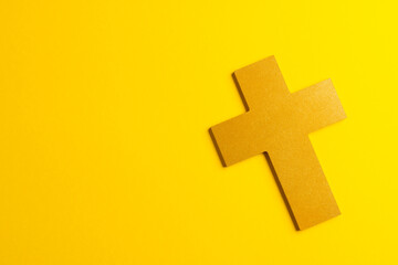 Composition of ash wednesday christian cross on yellow background with copy space
