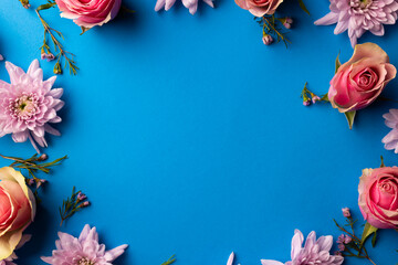 Composition of roses on blue background