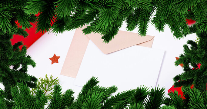 Image of christmas fir tree frame over card and envelope with copy space on white background