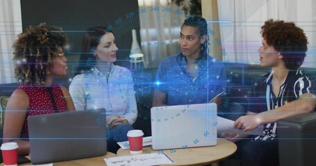 The video shows a group of business colleagues working together in an office - Powered by Adobe