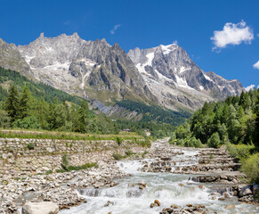 Fototapeta na wymiar The Grand Jorasses massif from Val Ferret valley - Entreves in Italy - Trekking Mont Blanc.