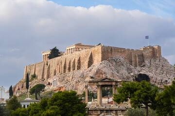 The Acropolis hill landmark from Athens, photographed from the Temple of Hadrian building. Travel to Greece.