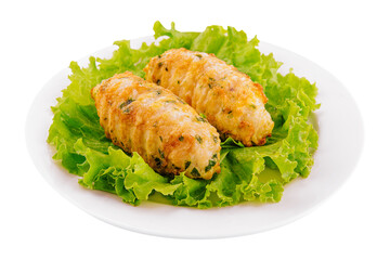 Chicken cutlets with salad greens on plate