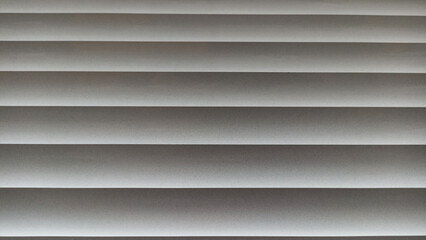 Fototapeta premium Window blinds with wavy gray striped background