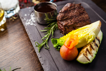 Black Angus Chateaubriant steak. Tenderloin from Brazil. Delicious healthy traditional food closeup served for lunch in modern gourmet cuisine restaurant - 552340872