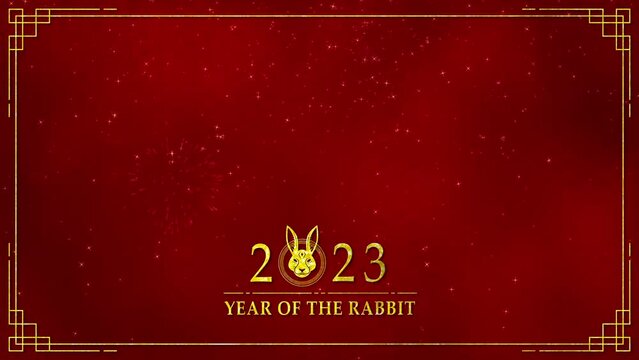 Motion graphic of Golden rabbit logo with chinese new year and year of the Rabbit 2023 on dark red background and glitter particle in a happy new year concept abstract background seamless loop video