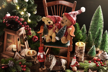Christmas still life with old teddy bears sitting on the chair with decorations in rustic style