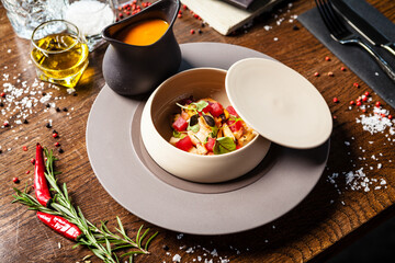 Bouillabaisse, Octopus, blue mussels, tuna, king prawns, Scottish salmon. Delicious healthy French traditional food closeup served for lunch in modern gourmet cuisine restaurant