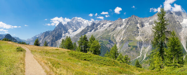 Naklejka na ściany i meble The panorama of Mont Blanc massif from Val Ferret valley in Italy.