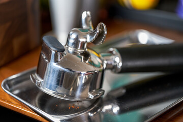 Close-up of coffee maker used by espresso machine