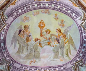  MORGEX, ITALY - JULY 14, 2018: The ceiling fresco of Eucharistic adoration of angels in church Chiesa di Santa Maria Assunta E. Lancia (1932). © Renáta Sedmáková